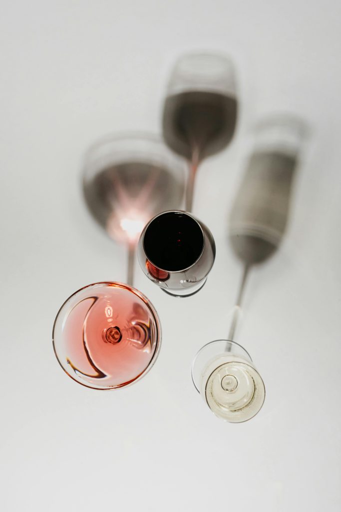 Top view of red, white, and rosé wine glasses — Wine SEO & Content Strategy for wine business.